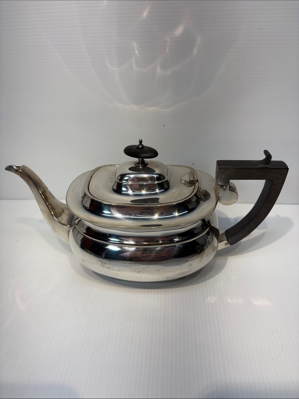 Antique Polished Silver Plated Teapot with Black Handle Stamped Underneath